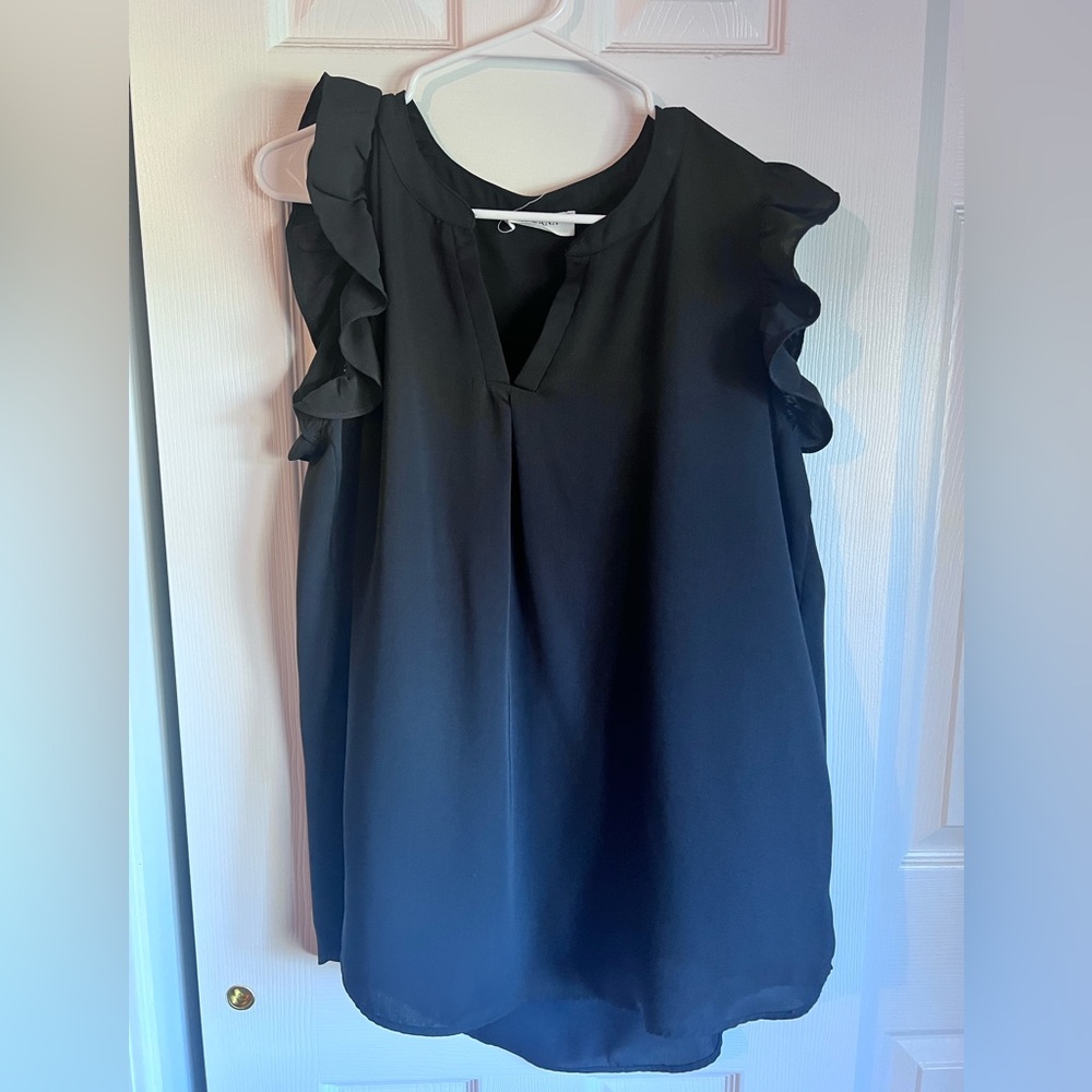 Cute black blouse size extra large. Brand is Zenana.